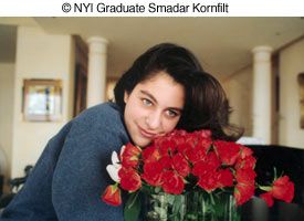 Woman with flowers photo by NYIP Graduate Smadar Kornfilt